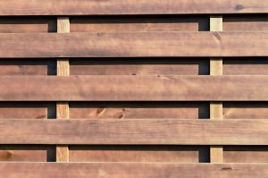 A close-up of a horizontal wooden fence.